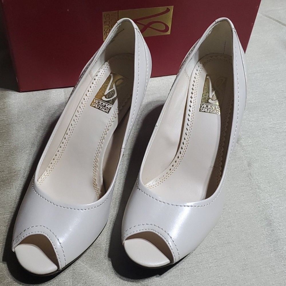 Victoria Spencer, Ivory colored, peep toe heels.